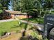 Well-maintained brick home with a neatly landscaped front yard and inviting walkway at 2059 Clearwater Se Dr, Marietta, GA 30067