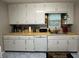 Functional kitchen featuring white cabinetry and ample counter space at 2059 Clearwater Se Dr, Marietta, GA 30067