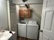 Convenient laundry area with washer and dryer and cabinet storage at 2059 Clearwater Se Dr, Marietta, GA 30067