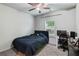 Comfortable bedroom with neutral walls, complemented by soft carpeting and natural light at 218 Piedmont Cir, Canton, GA 30114