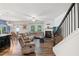 Bright open floor plan with a modern kitchen island, fireplace, and cozy living area at 218 Piedmont Cir, Canton, GA 30114