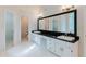 Bathroom with a large mirror, double vanity, and views into the bathroom at 2552 Berwick Walk, Snellville, GA 30078