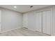 Simple bedroom with a closet and two entry doors at 2552 Berwick Walk, Snellville, GA 30078