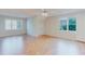 Spacious bedroom with hardwood floors and large windows offering ample natural light at 2552 Berwick Walk, Snellville, GA 30078