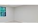 Empty bedroom with grey walls and hardwood floors with great natural lighting at 2552 Berwick Walk, Snellville, GA 30078