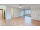 A large bedroom with hardwood floors and windows with wooden shutters and built in storage at 2552 Berwick Walk, Snellville, GA 30078