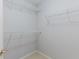 Walk-in closet featuring multiple wire shelves for optimal storage solutions at 2552 Berwick Walk, Snellville, GA 30078