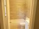 Updated bathroom featuring tile walls, bathtub, and showerhead at 2845 Woodhollow Ln, Jonesboro, GA 30236