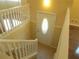 Bright entryway with a staircase and a decorative glass front door at 2845 Woodhollow Ln, Jonesboro, GA 30236