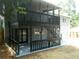 Home's exterior featuring deck, patio, and neutral paint at 2845 Woodhollow Ln, Jonesboro, GA 30236
