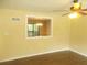 Bright living area featuring hardwood floors and a ceiling fan at 2845 Woodhollow Ln, Jonesboro, GA 30236