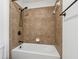 A cozy, fully tiled shower-tub combination, perfect for relaxation at 3700 Terrasol Sw Trl, Lilburn, GA 30047