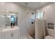 Bathroom features tile-look shower stall, modern vanity, and fixtures at 4324 Rocklane Dr, Conley, GA 30288