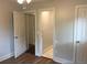 Bright bedroom with hardwood floors and white trim at 4324 Rocklane Dr, Conley, GA 30288