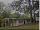 Charming one-story home with a carport and neutral paint at 4324 Rocklane Dr, Conley, GA 30288