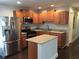 Modern kitchen featuring stainless steel appliances and a center island at 4324 Rocklane Dr, Conley, GA 30288