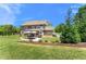 Large, well-maintained backyard with patio and outdoor dining at 592 Hayes Rd, Auburn, GA 30011