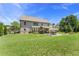 Expansive backyard view showing the patio and dining area at 592 Hayes Rd, Auburn, GA 30011