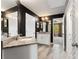 This bathroom has a large mirror and updated vanity with stone countertops at 592 Hayes Rd, Auburn, GA 30011