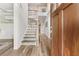 Grand foyer with hardwood floors, a staircase with patterned risers, and views to the second floor at 592 Hayes Rd, Auburn, GA 30011
