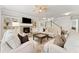 Comfortable living room with a fireplace, neutral tones, and ample seating at 592 Hayes Rd, Auburn, GA 30011