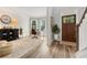 Inviting home office space featuring hardwood floors and bright natural light at 592 Hayes Rd, Auburn, GA 30011