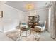 Bright sitting area features natural light, neutral paint, elegant decor, and comfortable seating at 592 Hayes Rd, Auburn, GA 30011