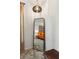 Full length mirror showing the reflection of the main bedroom with carpet flooring at 1667 Willow Way, Woodstock, GA 30188
