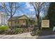 Charming Century House Tavern with outdoor seating, beautiful landscaping, and inviting entrance at 1667 Willow Way, Woodstock, GA 30188
