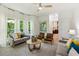 Inviting living room with hardwood floors, modern furnishings and access to outdoor living at 1667 Willow Way, Woodstock, GA 30188