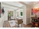 Comfortable sitting area with hardwood floors and white trim at 1667 Willow Way, Woodstock, GA 30188