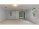 Finished basement with natural light from windows and sliding glass door to backyard at 4546 Windsor Oaks Ct, Marietta, GA 30066