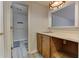 Bathroom with decorative lighting, storage and tiled floors at 4546 Windsor Oaks Ct, Marietta, GA 30066