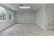 Bright, carpeted room with neutral paint, large windows and closet at 4546 Windsor Oaks Ct, Marietta, GA 30066