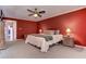 Bright bedroom features a ceiling fan, and side tables, creating a cozy and relaxing space at 4546 Windsor Oaks Ct, Marietta, GA 30066