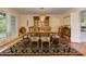 Bright dining room with hardwood floors, stylish chandelier, and traditional furnishings at 4546 Windsor Oaks Ct, Marietta, GA 30066