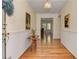 Inviting entryway with hardwood floors, stylish console table, and classic wall decor at 4546 Windsor Oaks Ct, Marietta, GA 30066