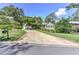 Pleasant home featuring a manicured yard, lush greenery, and an attached two-car garage at 4546 Windsor Oaks Ct, Marietta, GA 30066