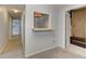 Bright hallway featuring carpet floors and architectural details at 4546 Windsor Oaks Ct, Marietta, GA 30066
