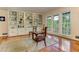Bright living room features hardwood floors, built-in bookshelves, and sun-filled windows at 4546 Windsor Oaks Ct, Marietta, GA 30066
