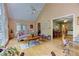 Vaulted living room with hardwood floors and access to other rooms in the home at 4546 Windsor Oaks Ct, Marietta, GA 30066