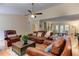 Spacious living room featuring hardwood floors, comfortable seating, and seamless flow to other areas at 4546 Windsor Oaks Ct, Marietta, GA 30066
