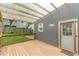 Outdoor deck with pergola and access to the home's interior at 947 Rebel Forest Dr, Atlanta, GA 30315