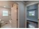 Bright bathroom with modern tiling and fixtures, offering a clean and updated space at 947 Rebel Forest Dr, Atlanta, GA 30315