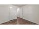 A bedroom featuring wood-look floors, neutral paint and a large closet at 947 Rebel Forest Dr, Atlanta, GA 30315
