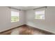 A light-filled room showcasing hardwood floors, windows, and neutral walls at 947 Rebel Forest Dr, Atlanta, GA 30315