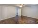 A cozy bedroom with hardwood floors, neutral walls, and easy access to the closet at 947 Rebel Forest Dr, Atlanta, GA 30315