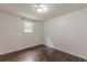 Bedroom featuring hardwood floors, neutral colors, and lots of natural light at 947 Rebel Forest Dr, Atlanta, GA 30315