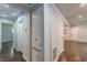 Hallway with hardwood floors and doorways leading to other rooms in the house at 947 Rebel Forest Dr, Atlanta, GA 30315