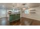 Open kitchen with modern lighting, stainless steel appliances, and a large island at 947 Rebel Forest Dr, Atlanta, GA 30315
